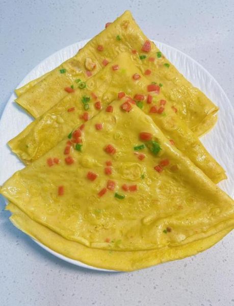煎鸡蛋饼怎么做_鸡蛋饼为什么总是散