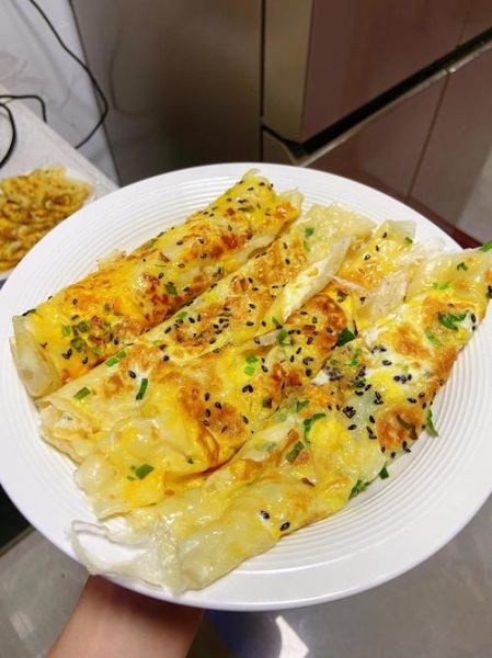 煎鸡蛋饼怎么做_鸡蛋饼为什么总是散