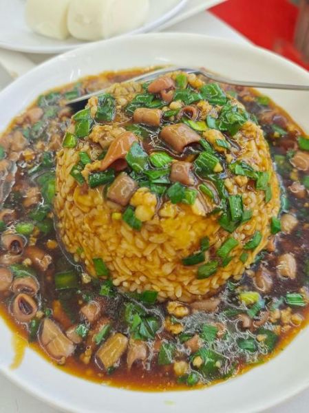 海肠捞饭怎么做_正宗海肠捞饭做法